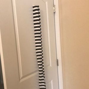 Simple long thin black and white striped scarf